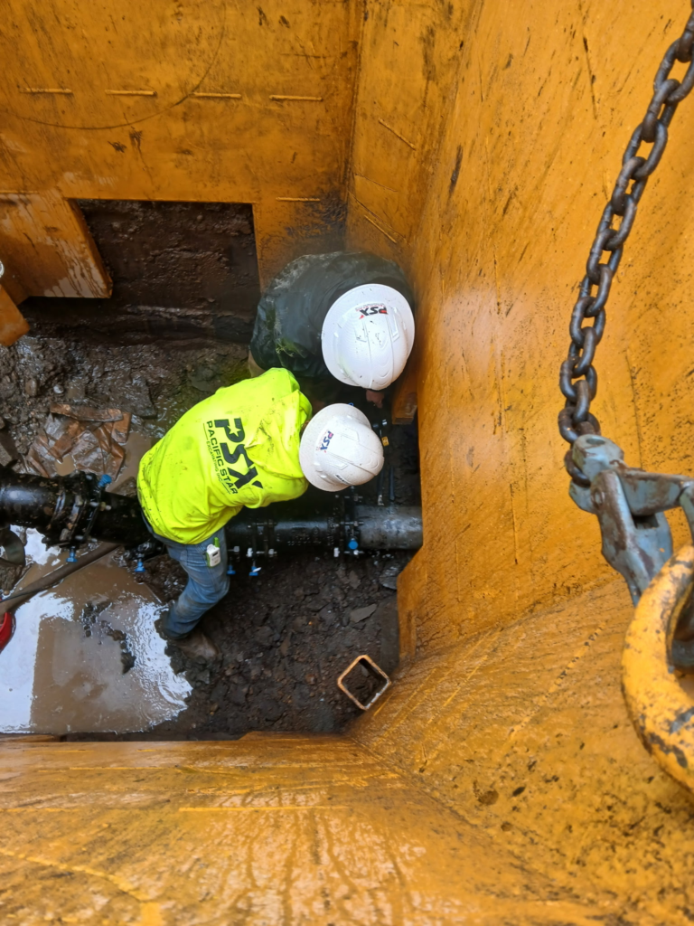Sewer reroute and water main work at the Veterans Village site, September 2026